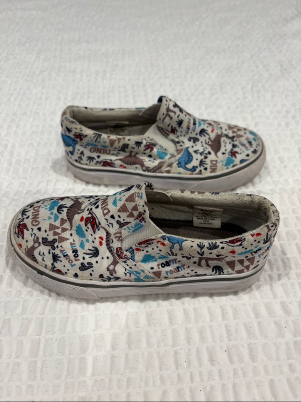 Tommy Bahama Kids Slip-On Canvas Shoes with Dino Print
Size 9
